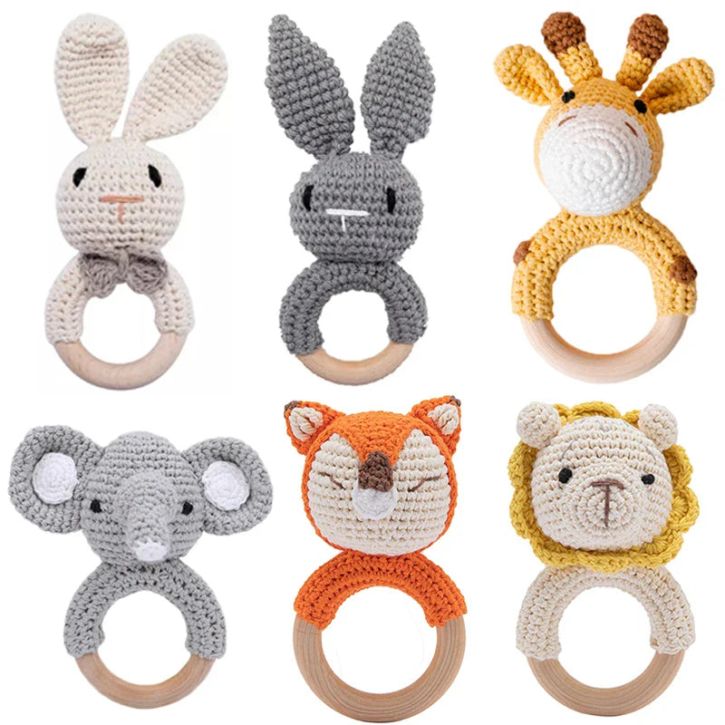 Set of crochet baby rattle toys with animal designs and wooden teether rings for newborns