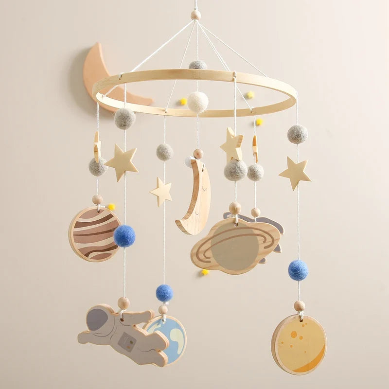 Custom baby mobile with wooden planets, astronaut, stars, and personalized name option hanging musical nursery decor