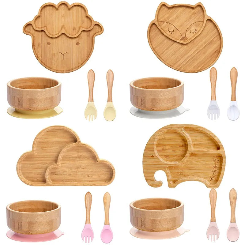 4-piece bamboo kids tableware set with suction plate, bowl, spoon, and fork in cute animal and cloud designs